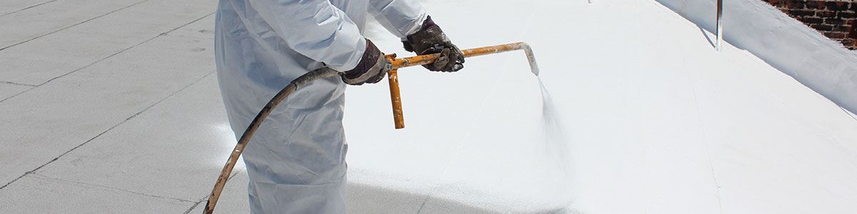 roofer spraying paint